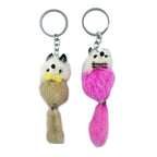 Handcrafted little fox keyring charm with fluffy tail.