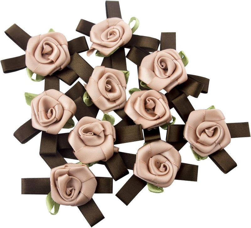 Large rose blush flower trim with chocolate brown and green ribbons.