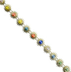 Close-up of gold tone trim showcasing colourful centre crystals.