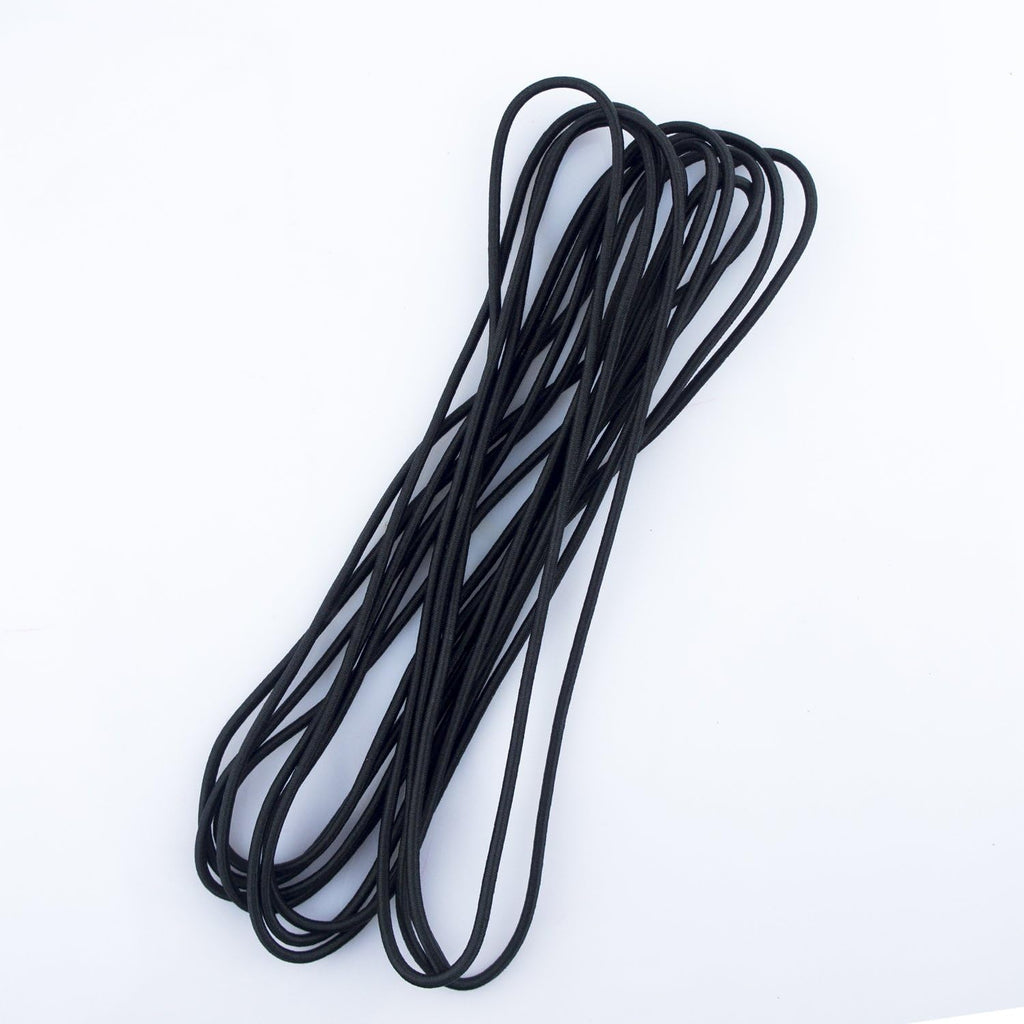 Black round sewing elastic on a measuring tape