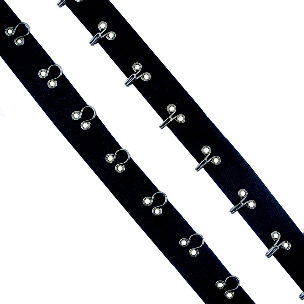 Continuous gun metal hooks and eyes on black cotton tape.