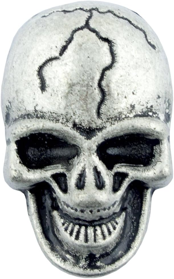 Close-up of a grey metal skull stud showing detail