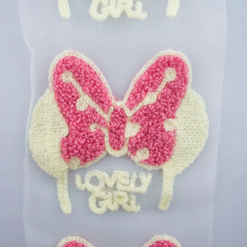 Display of 'Lovely Girl' butterfly design trim on fabric