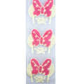 Close-up of pink butterfly decorative trim with net backing