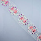 Full metre of pink bow heart design trim displayed.
