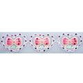 Close-up of pink bow in a heart design fabric trim.