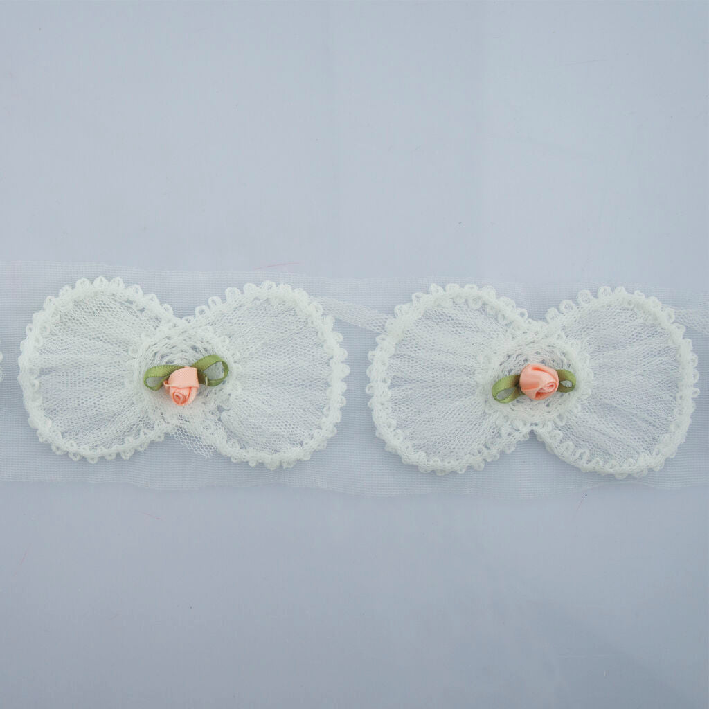 Pack of 10 heart trims with net backing for sewing.