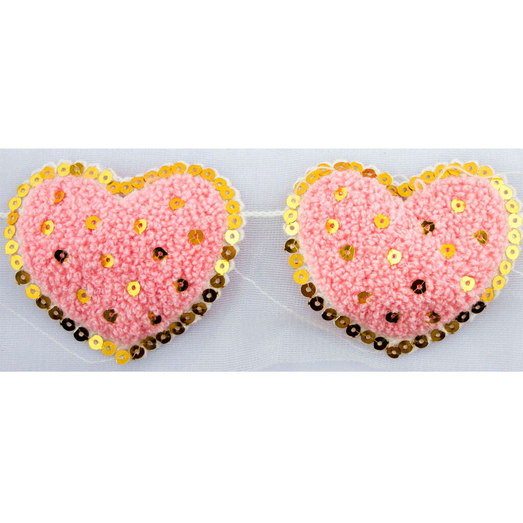 Close-up of pink heart trim with gold sequins on net backing