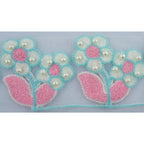 Close-up of the decorative trim showcasing the double flower design.