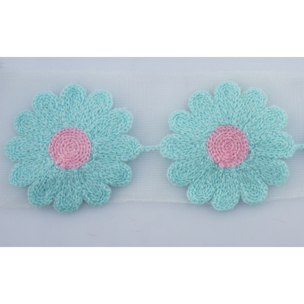 Display of 14 pieces of flower trim, each measuring 6.4x6.4cm.