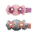 Pair of glittery candy hairclip barrettes with flowers