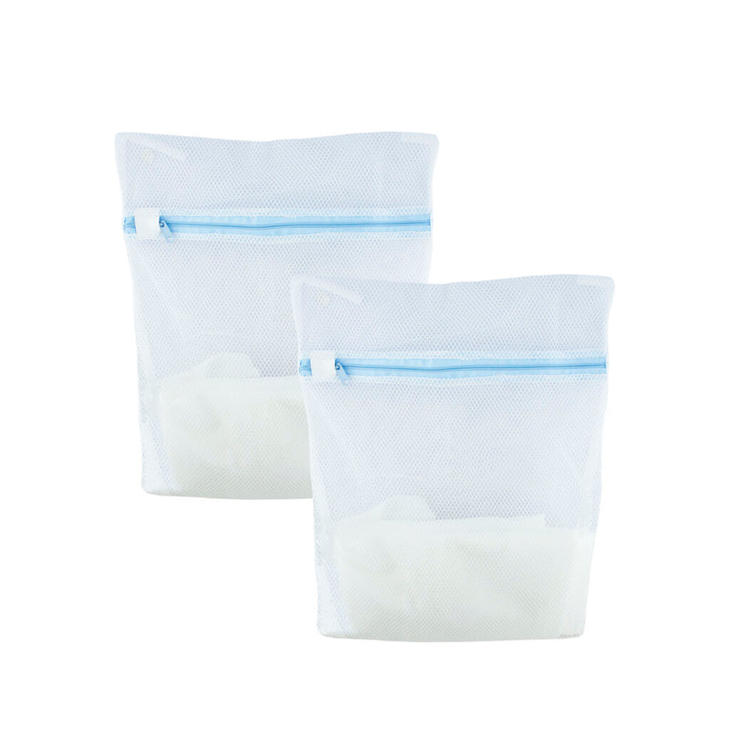 Two small tough dense net laundry wash bags in use