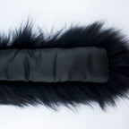 Black fake fur collar laid flat to show dimensions and design
