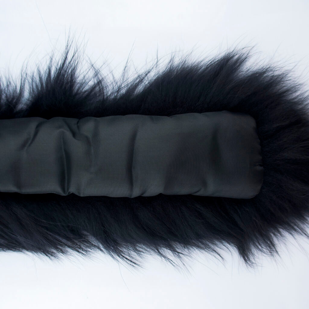 Black fake fur collar laid flat to show dimensions and design