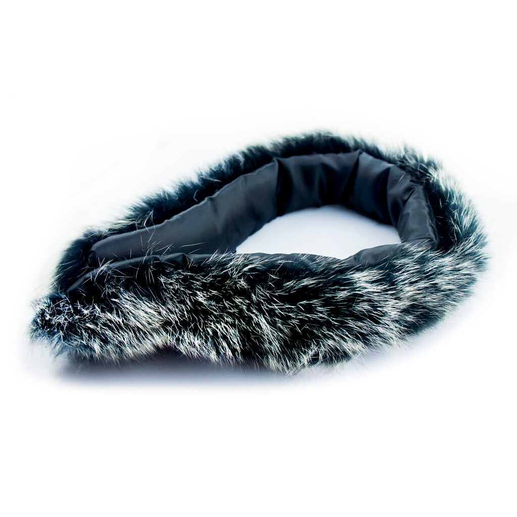 Luxurious black and white fake fur collar displayed on a mannequin.