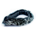 Luxurious black and white fake fur collar displayed on a mannequin.