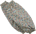 Two pairs of polka dot sleeve protectors displayed on a table.