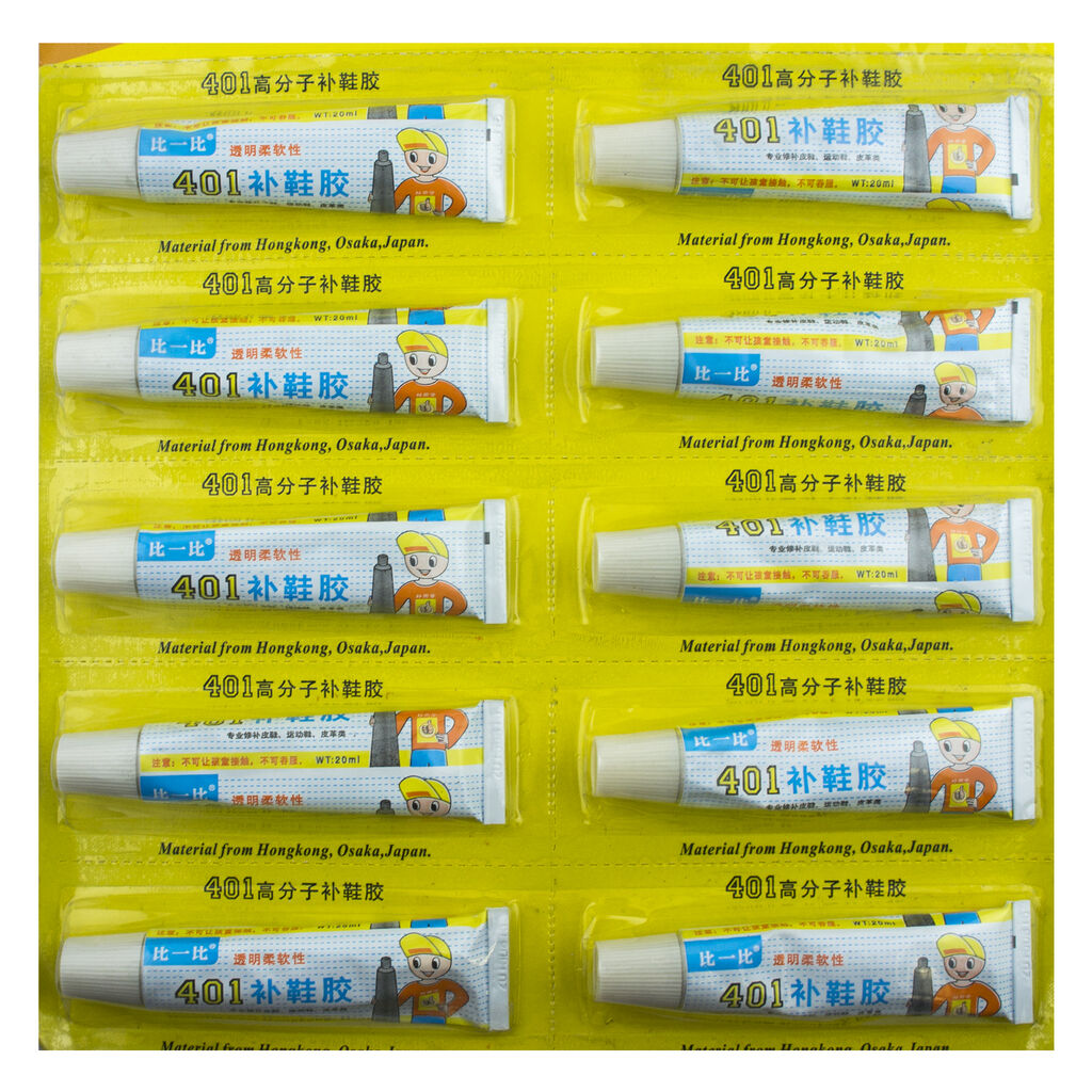 Close-up of macromolecular shoe repair glue tubes showing details.