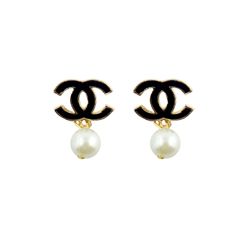 Set of 2 stylish brooches featuring pearl effect beads and black enamel motif