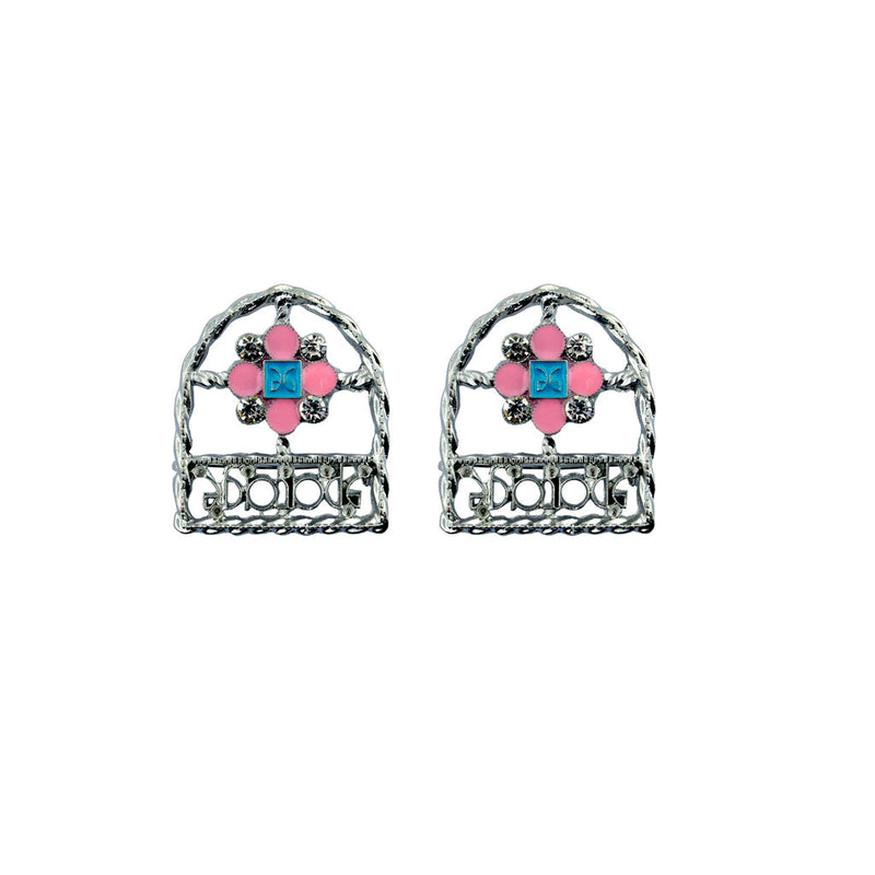 Stylish brooch with pink and blue enamel and white crystals.