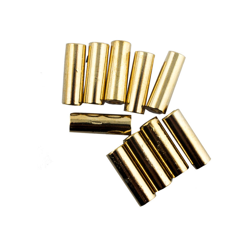 Pack of 10 gold tone metal cord ends, size 20 x 5 mm.