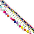 Colourful pom pom trim displayed on a white background.