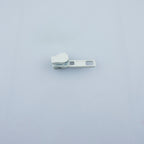 Close-up of a white automatic head slider zip pull for sewing.