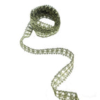 Antique gold metallic sew in trim displayed on a white background.