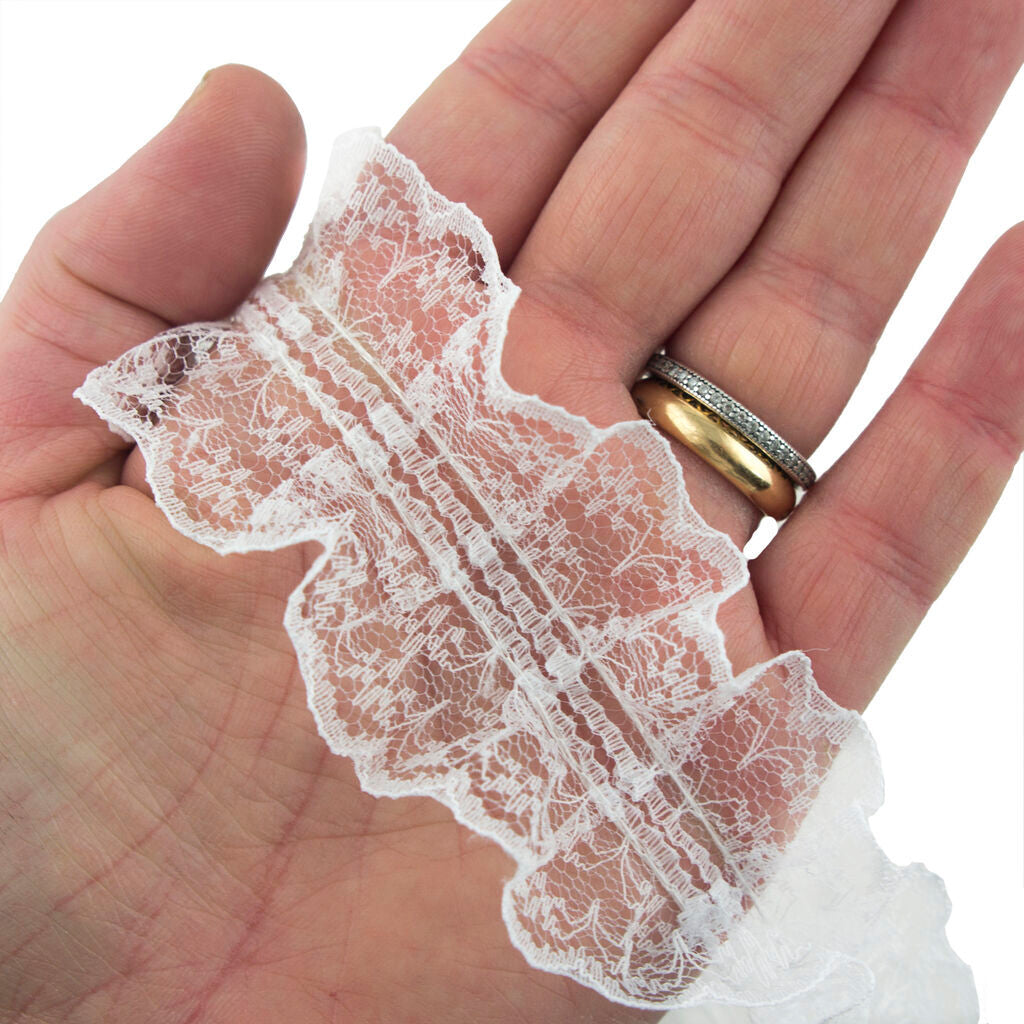 Black lace trim border used on a clothing accessory