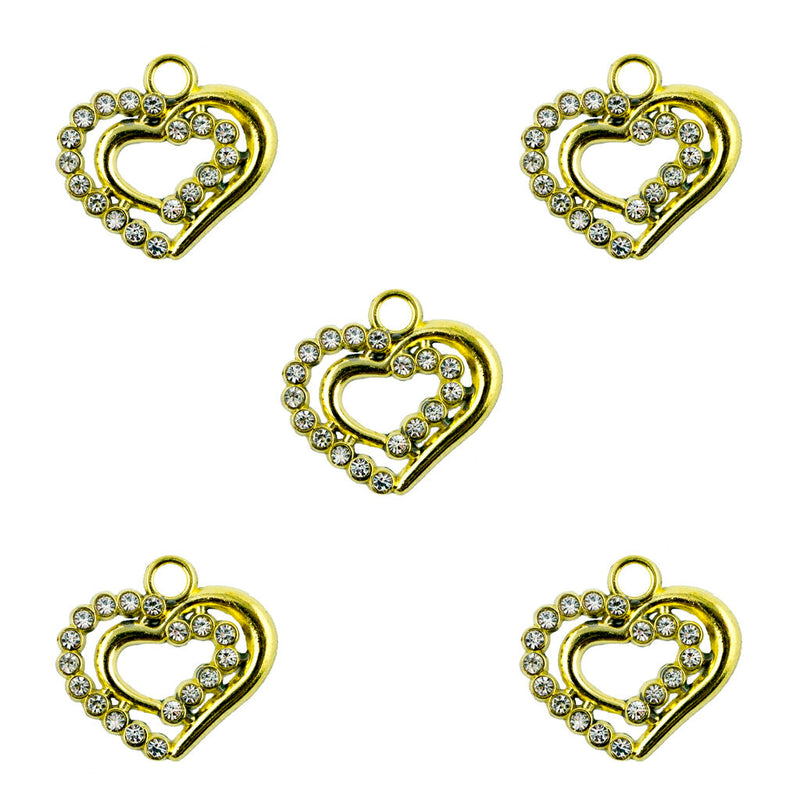Gold tone heart pendant with white crystals, 25 x 20 mm.
