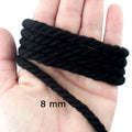 Black rope trim on a white background, 8 mm diameter.
