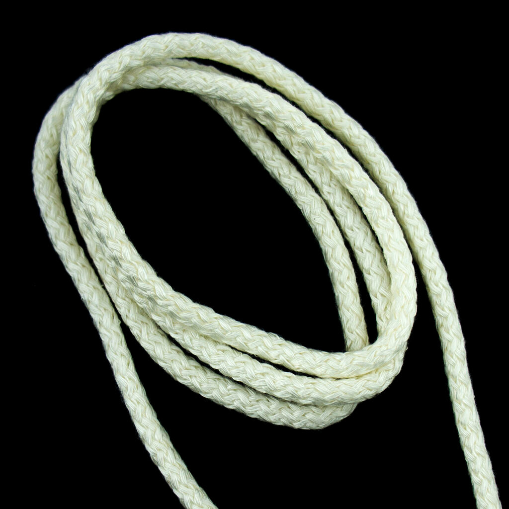 Close-up of 4mm diameter off white silky rope trim for crafts.