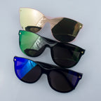 Sunglasses displayed on a neutral background highlighting their design.