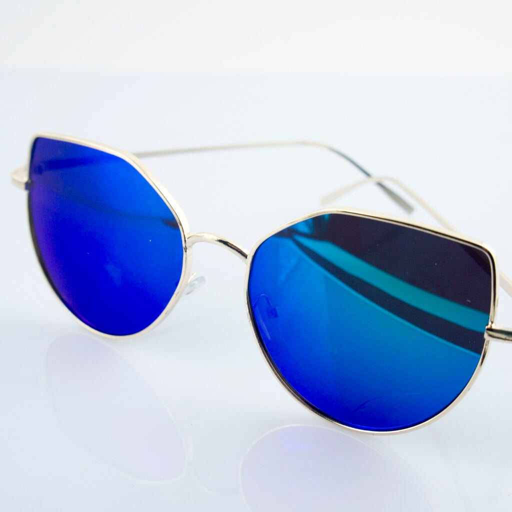 Close-up of stylish angular framed aviator sunglasses showing detail.