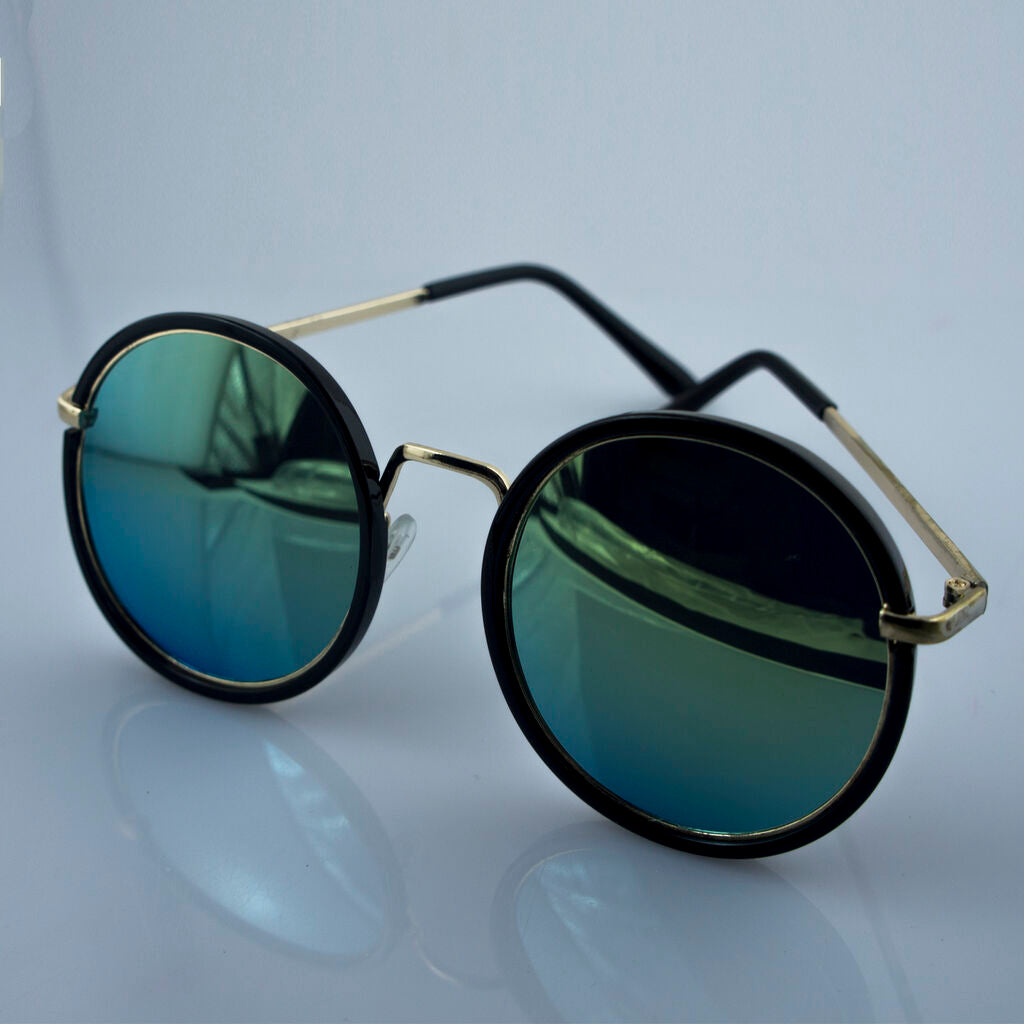 Close-up of stylish round framed sunglasses showcasing the frame design.