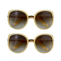 Two pairs of ladies' nude frame fashion sunglasses displayed.