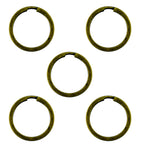 Five vintage gold tone metal keyrings displayed together.