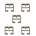 Four light shiny gold square metal buckles on a white background.