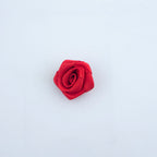 Close-up of a single deep red rose ribbon trim, 21 mm diameter.