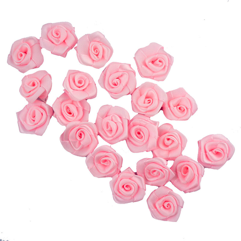 Pack of baby pink rose ribbon trims for embellishing garments.