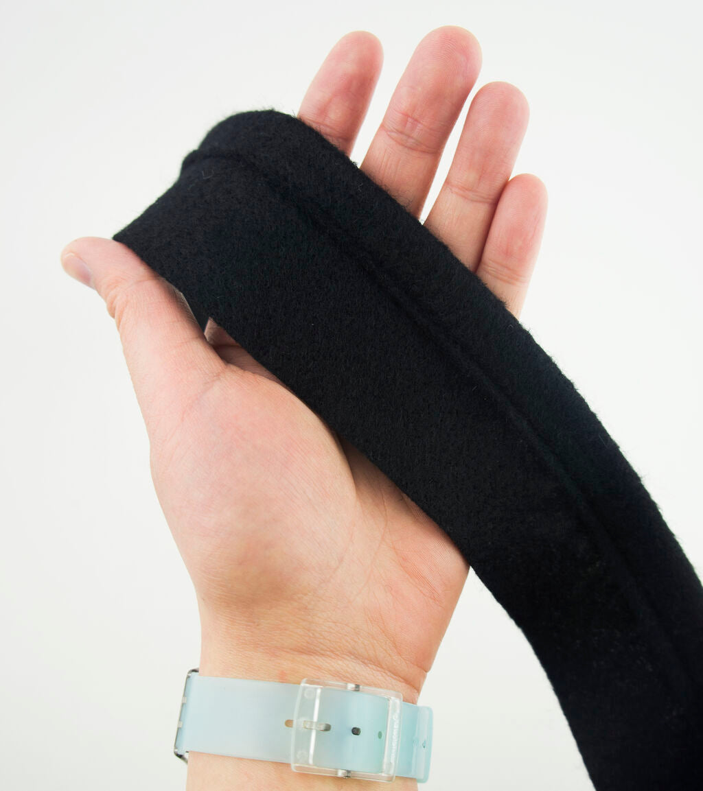Packaging of the black sleeve head roll for retail display.