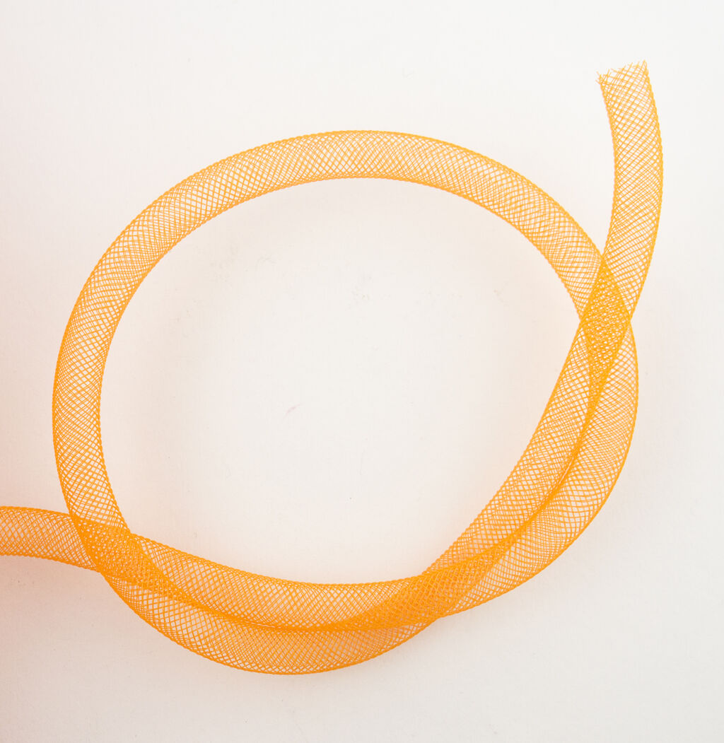 Pack of 30 metres of elastic tubular crin trim in bright orange.