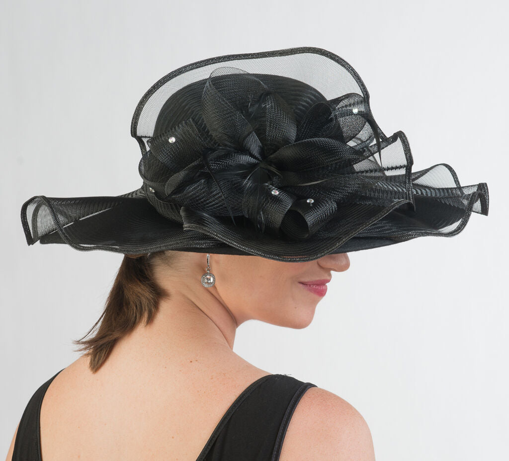 Black nylon crin trim rolled up for easy storage