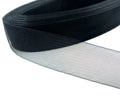 Black nylon crin trim displayed on a white background