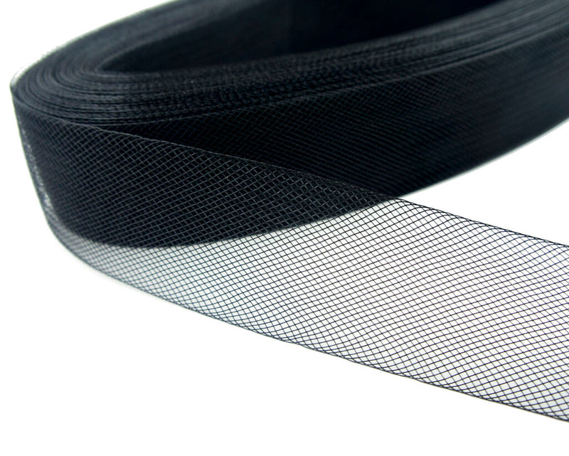 Black nylon crin trim displayed on a white background
