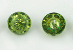 Close-up of a light green crystal button showing its unique design.