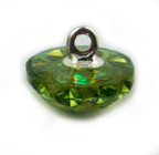 Light green crystal button on a knitted fabric swatch.