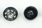 Close-up of a 12mm black and white fashion crystal button.