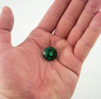 Side view of a 16mm green crystal button