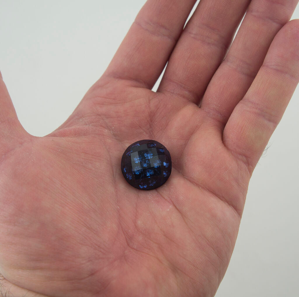 Pack of 2 midnight blue crystal buttons displayed together.